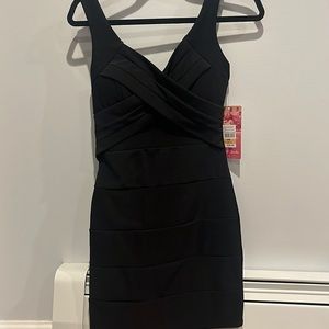 Fancy black short dress. Good quality